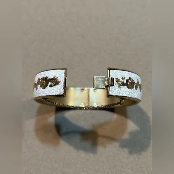 Gold Bangle Bracelet Coated in White with Gold Floral Accents. Clasp Closure - Picture 5 of 6